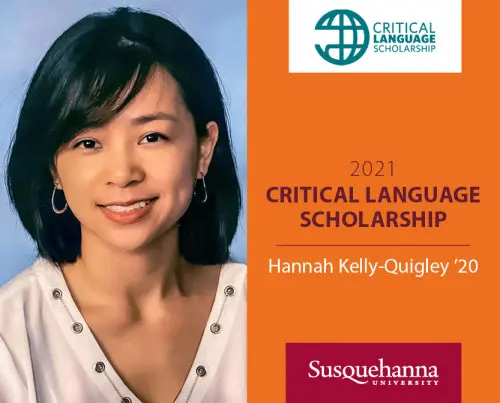 A woman with short dark hair smiles against a light blue background. Text beside her reads: "2021 Critical Language Scholarship, Hannah Kelly-Quigley '20." Below is the Susquehanna University logo.