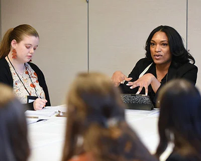 Ariana Stowe '13, right, financial representative at Northwestern Mutual and owner of Ariana Stow...
